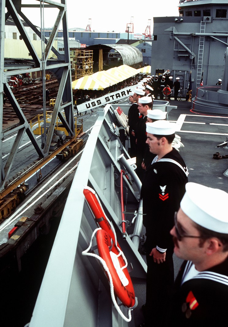 23 October 1982: Crewmen man the rails of the USS Stark FFG-31 at the commissioning ceremony.