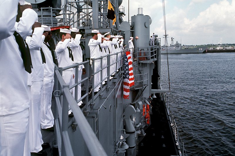 5 August 1987: Crew members man the rails of Stark upon the ship's return to home port.