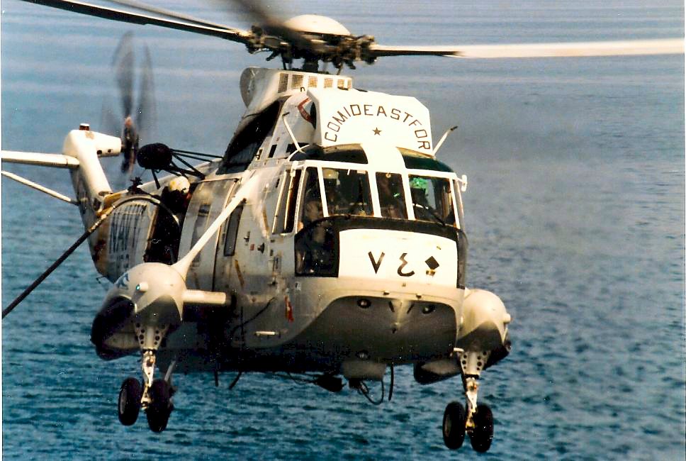18 May 1987: A Sikorsky SH-3, the Desert Duck, assigned to COMIDEASTFOR in the Persian Gulf. This was the aircraft that 
                            transferred the Coontz Rescue and Assistance Detail to the Stark after the 17 May 1987 Iraqi attack.