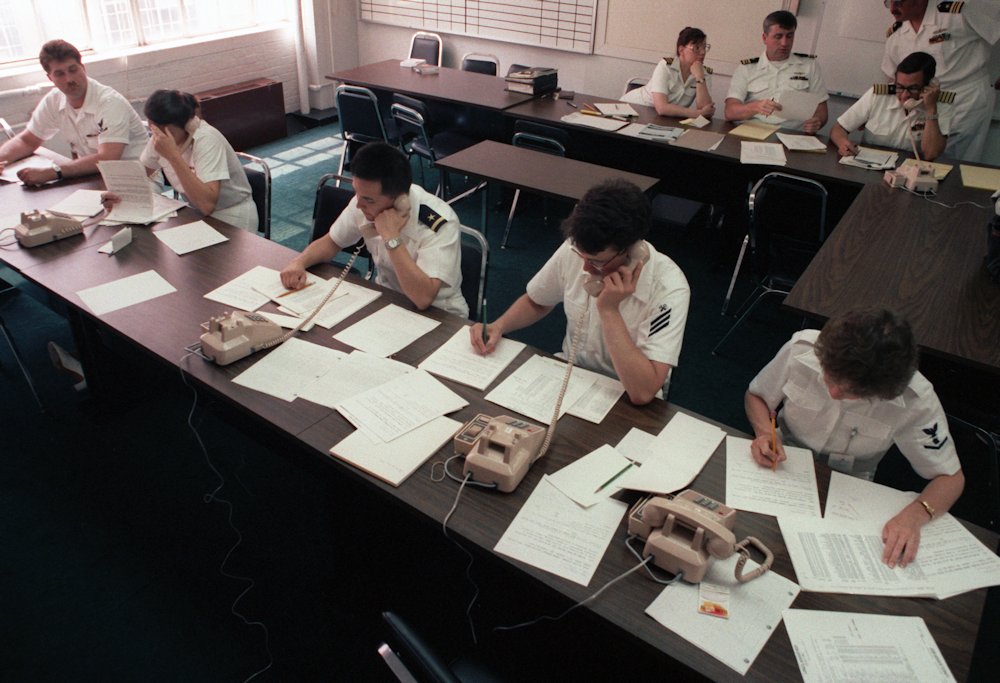 May 17, 1987: US Navy personnel take calls at the Emergency Coordination Center regarding the Stark attack.