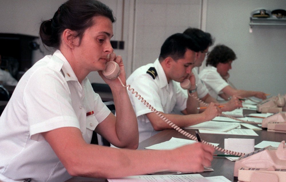 May 17, 1987: US Navy personnel take calls at the Emergency Coordination Center regarding the Stark attack.
